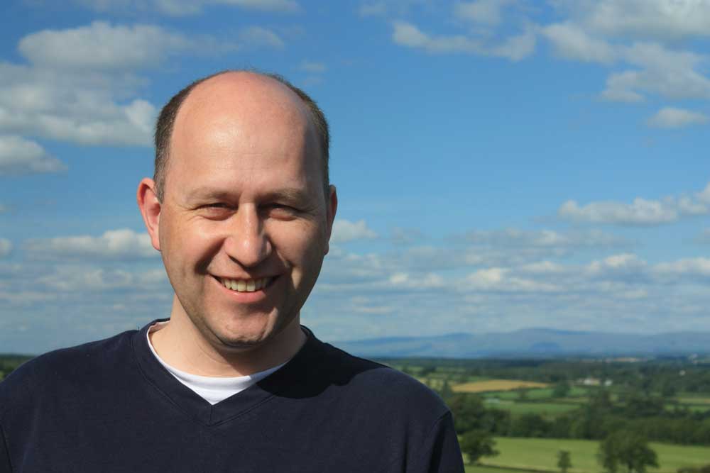 CareAcross-smiling-man