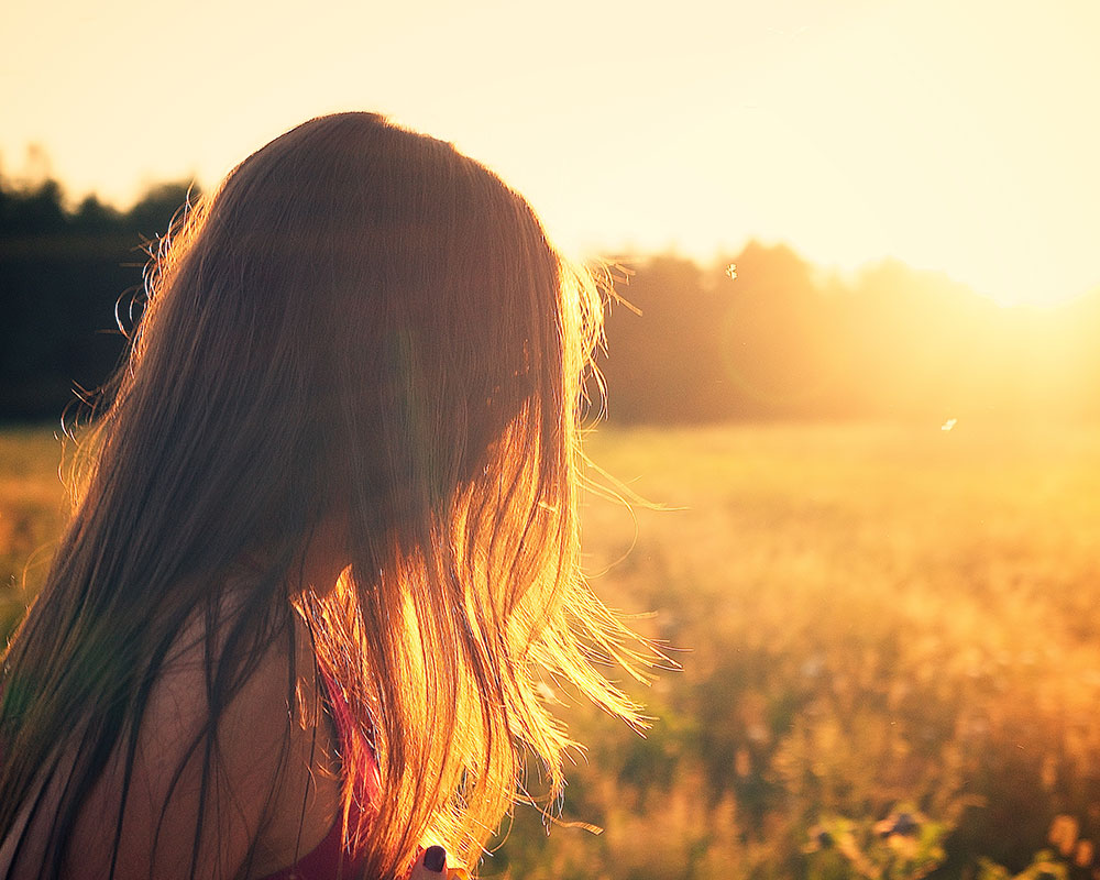 CareAcross-sunset-woman