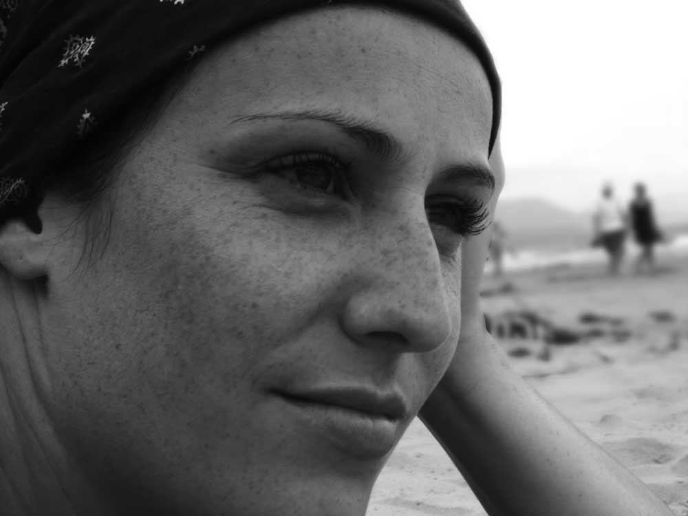 CareAcross-woman-scarf-smile